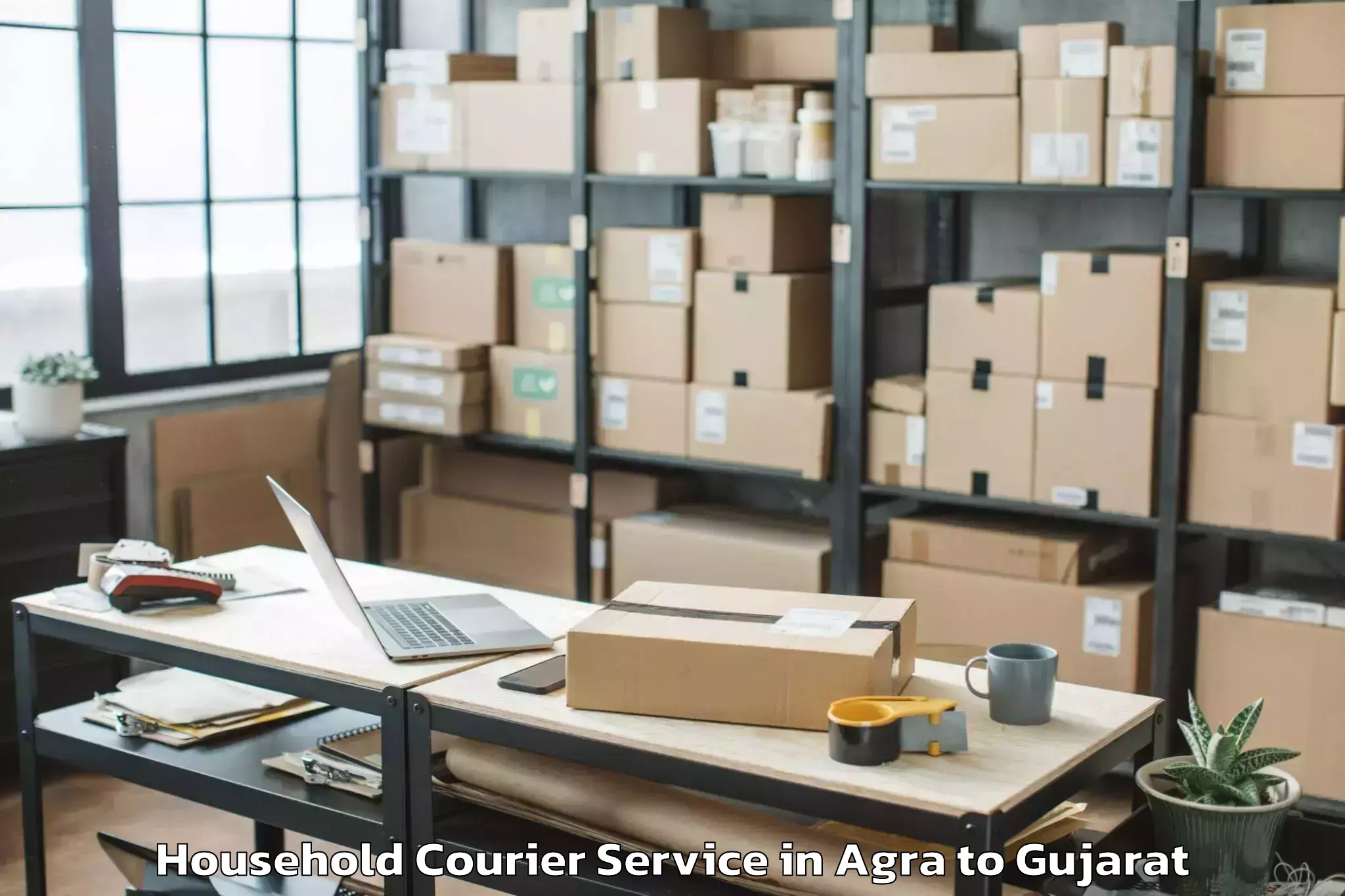 Get Agra to Gandhinagar Household Courier